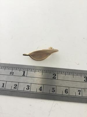 Gold tone leaf pin