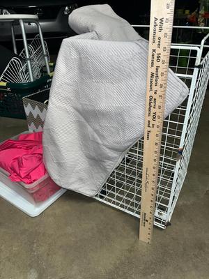Sale Photo Thumbnail #163: Metal laundry basket on wheels, storage ottoman with hangers, 2 sets of twin sheets and more