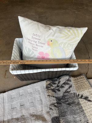 Basket, pillow and rug