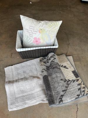 Basket, pillow and rug
