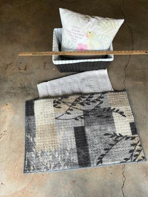 Basket, pillow and rug