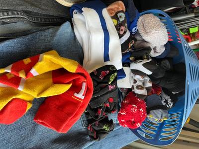 Sale Photo Thumbnail #246: Men's jeans included 7 for all Mankind and others, shoes, tote full of belts and suspenders, basket full of socks