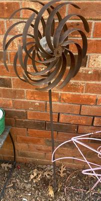 Sale Photo Thumbnail #382: Metal pinwheel garden stake around 5 ft tall