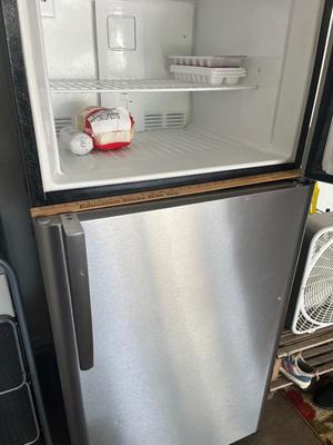 Sale Photo Thumbnail #678: Stainless steel color refrigerator. Works great, super cold. See pics for specifications