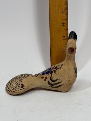 Sale Photo Thumbnail #319: This bird has been broken at the neck and then glued together. Approx. 4" tall.