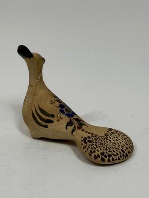 Sale Photo Thumbnail #321: This bird has been broken at the neck and then glued together. Approx. 4" tall.