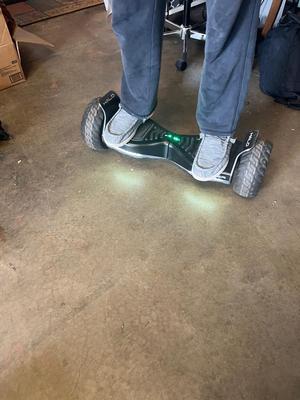 Sale Photo Thumbnail #699: Basically the best type of hoverboard out there. This is an off-road board with bluetooth so you can listen to your tunes while cruising through where ever you want to go. Long-lasting charge and self-balancing power with the big wheels makes this safe an