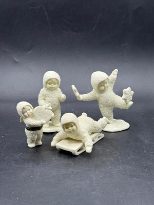 Sale Photo Thumbnail #337: All in good condition. There is what looks like a missing bump on the sledding figure's hip.