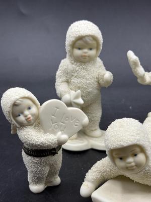 Sale Photo Thumbnail #340: All in good condition. There is what looks like a missing bump on the sledding figure's hip.