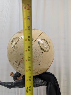 Superman Holding The Globe Light