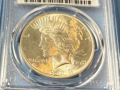PCGS CERTIFIED 1923-P MS64 GRADED PEACE SILVER DOLLAR AS PICTURED. (COIN #8129).