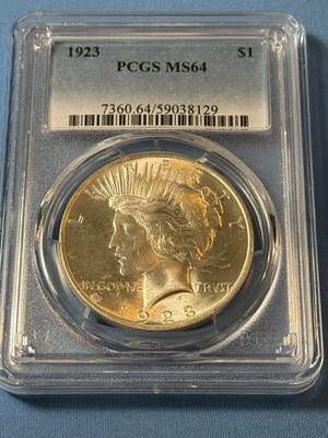 PCGS CERTIFIED 1923-P MS64 GRADED PEACE SILVER DOLLAR AS PICTURED. (COIN #8129).