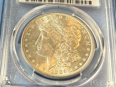 PCGS CERTIFIED 1886-P MS65 GRADED MORGAN SILVER DOLLAR AS PICTURED. (COIN #8120).