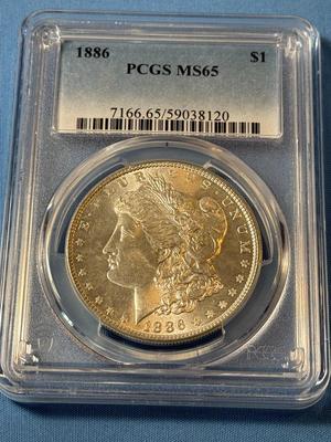 PCGS CERTIFIED 1886-P MS65 GRADED MORGAN SILVER DOLLAR AS PICTURED. (COIN #8120).