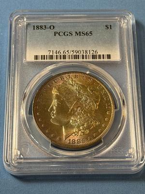 PCGS CERTIFIED 1883-O MS65 GRADED GORGEOUS TONED MORGAN SILVER DOLLAR AS PICTURED. (COIN #8126).