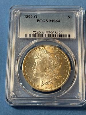PCGS CERTIFIED 1899-O MS64 GRADED MORGAN SILVER DOLLAR AS PICTURED. (COIN #8127).