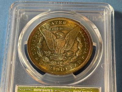 PCGS CERTIFIED 1879 MS64 GRADED SUPERBLY TONED MORGAN SILVER DOLLAR AS PICTURED.