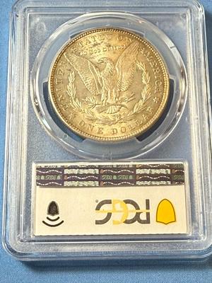 PCGS CERTIFIED 1889 MS65 TONED MORGAN SILVER DOLLAR AS PICTURED.