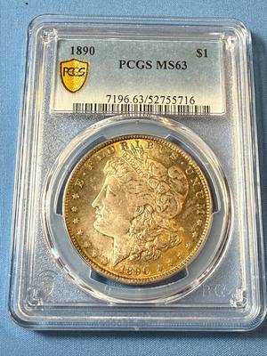 PCGS CERTIFIED 1890 MS63 TONED MORGAN SILVER DOLLAR AS PICTURED.