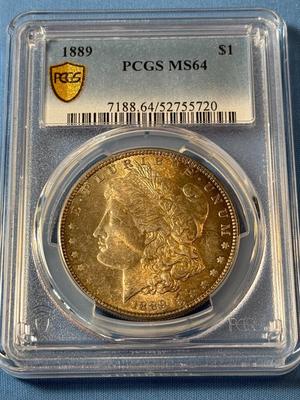 PCGS CERTIFIED 1889 MS64 TONED MORGAN SILVER DOLLAR AS PICTURED.