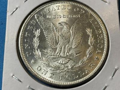 1879-S UNCIRCULATED CONDITION MORGAN SILVER DOLLAR (COIN #17).