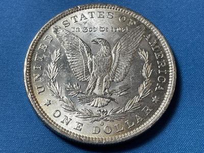 1881-O UNCIRCULATED CONDITION MORGAN SILVER DOLLAR (COIN #27).