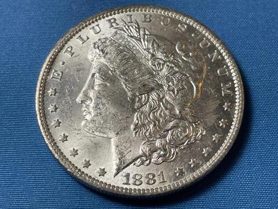 1881-O UNCIRCULATED CONDITION MORGAN SILVER DOLLAR (COIN #27).
