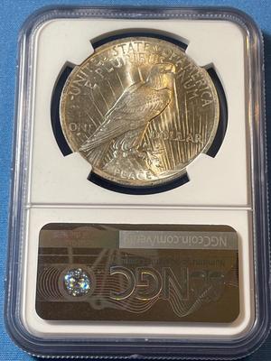 NGC CERTIFIED 1923 MS63 GRADED PEACE SILVER DOLLAR AS PICTURED.