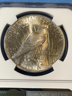 NGC CERTIFIED 1923 MS63 GRADED PEACE SILVER DOLLAR AS PICTURED.