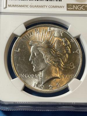NGC CERTIFIED 1923 MS63 GRADED PEACE SILVER DOLLAR AS PICTURED.