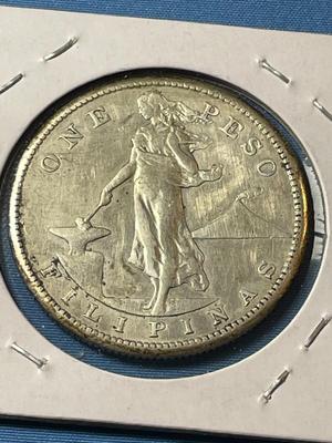 PHILIPPINES 1909-S VERY FINE CONDITION HEAVILY CLEANED PESO SILVER COIN AS PICTURED.