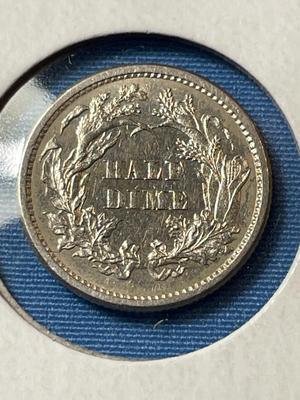 1860 AU/UNCIRCULATED CONDITION CLEANED SEATED LIBERTY HALF DIME TYPE COIN AS PICTURED.