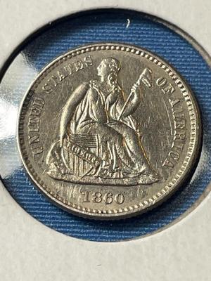 1860 AU/UNCIRCULATED CONDITION CLEANED SEATED LIBERTY HALF DIME TYPE COIN AS PICTURED.