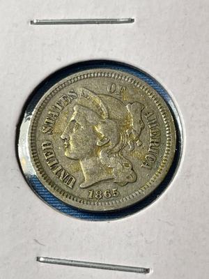1865 CIRCULATED CONDITION THREE CENT NICKEL TYPE COIN AS PICTURED.
