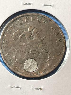 BANK OF UPPER CANADA 1852 COUNTERSTAMPED & PLUGGED HALF PENNY TOKEN AS PICTURED.