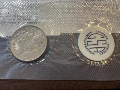 1922-P Peace Dollar GSA Soft Pack United States Uncirculated Silver Dollar Coin as Pictured.