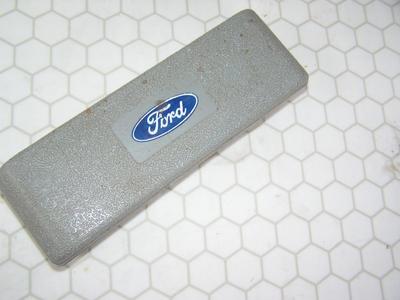 Ratcheting driver set w/bits & sockets. “Ford” logo on top