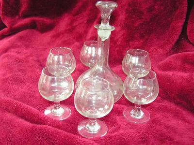 Brandy decanter with 6 snifters, decanter has lapped stopper and is etched