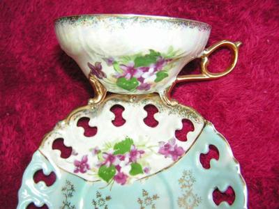 Vintage Royal Crown Arnart (Japan) 3-footed teacup & saucer set.