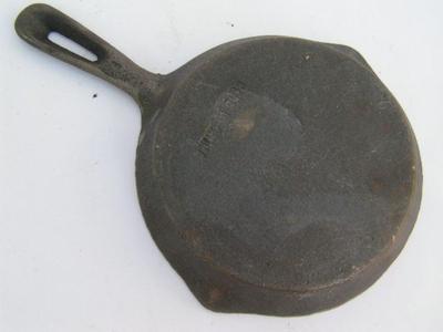 Small cast iron skillet, about 6"