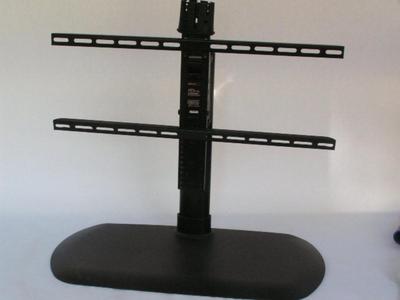 Universal swiveling flat screen TV Base. Instructions say it fits 32" to 65" TVs