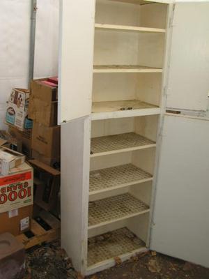 Storage cabinet, 71" tall, 24+” wide, 13" deep