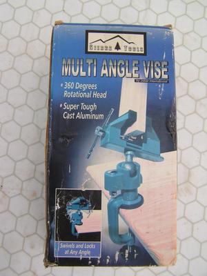 Multi angel vise. clamps to table or counter top,