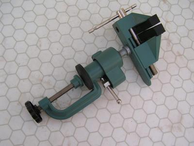 Multi angel vise. clamps to table or counter top,