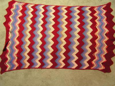 Crocheted afghan, multi color, about 40"x62" fair condition