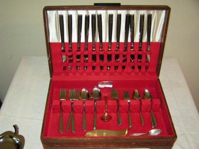 Rogers stainless steel flatware set in case. W/some misc pieces