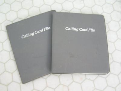 2 business card folders, 56 cards total in each