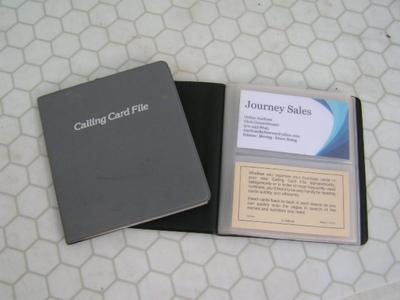 2 business card folders, 56 cards total in each