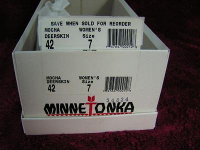 MINNETONKA Moccasins size 7 womens, look like new/unused.