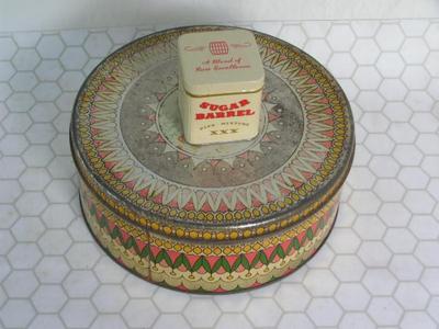 Two tins full of buttons & zippers & stuff